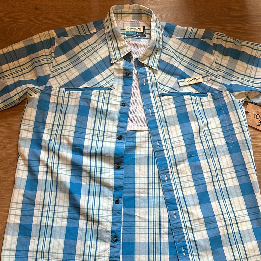 Never worn aqua blue fishing shirt from Magellan. UPF 30 proof
